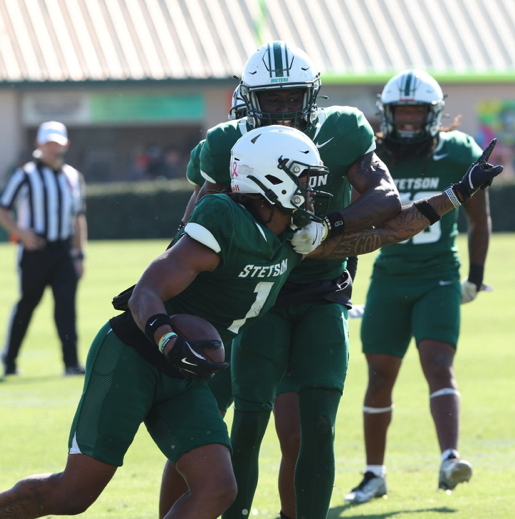 Stetson football players during practice